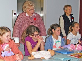 Mitchell Optimist Club members Ruth Ann Gray (back, left) and Cheryl Davidson listen in on the babysitting course taught by the St. John Ambulance at the West Perth Public Library last Friday, Nov. 8. The course was one of several events sponsored this month, as part of Youth Appreciation Month. KRISTINE JEAN/MITCHELL ADVOCATE