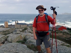 Terry Vinet of St. Thomas stands on a hill at Muxia, Spain after walking about 920 km from France to Spain in October. Vinet trekked the Camino de Santiago, a trail that follows the steps believed to have been taken by the Christian apostle St. James.