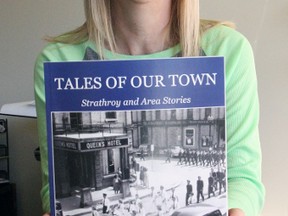 Aileen Cnockaert shows off the soon-to-be-released Strathroy and District Historical Society “Tales of Our Town: Strathroy and Area Stories”. The nearly 200-page book contains over 60 stories detailing many people and events that have shaped the history of Strathroy.
JACOB ROBINSON/AGE DISPATCH/QMI AGENCY