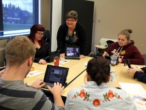 Janice Smith uses apps on iPad devices as a teaching tool for her class in the Developmental Service Worker program at Lambton College. (MELANIE ANDERSON, The Observer)