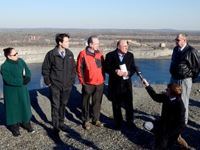 Marmora and Lake Deputy Reeve Rita Cimprich, left, welcomes Ontario Minister of Economic Development, Trade and Employment Eric Hoskins; Peterborough MPP and Ontario Minister of Rural Affairs Jeff Leal; Chief operating officer and chief development officer of Northland Power Inc. Sam Mantenuto and Hastings County warden Rick Phillips to the Marmora Mine Thursday afternoon. The Ontario government has given the municipality $50,000 to conduct a study on the potential tourism and economic benefits of the Marmora and Lake pumped storage project. 
EMILY MOUNTNEY/THE INTELLIGENCER/QMI Agency