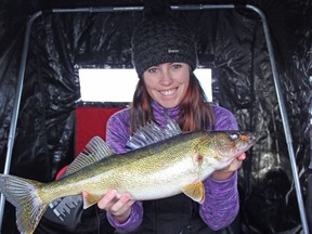 Ashley Rae, host of Captured, with a walleye she caught on the Bay of Quinte. (Supplied photo)