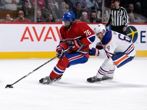 Montreal Canadiens defenceman P.K. Subban skates away from the check of Edmonton Oilers forward Nail Yakupov during NHL play at the Bell Centre. (Eric Bolte/USA TODAY Sports)