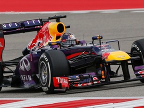 Red Bull driver Sebastian Vettel of Germany drives during the qualifying session of the U.S. Grand Prix at the Circuit of the Americas in Austin, Tex., November 16, 2013. (REUTERS/Adrees Latif)