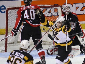 Kingston Frontenacs’ Darcy Greenaway, right, celebrates his power-play goal with Spencer Watson during Ontario Hockey League action against the Ottawa 67s at the Rogers K-Rock Centre on Sunday. Kingston won 8-0. (Ian MacAlpine The Whig-Standard)