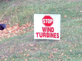 Lawn signs like this one, protesting wind turbines, are starting to attract the attention of municipal councils.