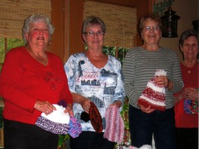 The 'hat ladies', from left: Mary Anne Kersten, Gay Wood, Dianne Kersten and Jean Schelken.  Contributed Photo