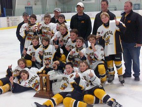 Members of the Mitchell Pee Wee hockey team celebrate their championship at the Lucknow Legion tournament held this past weekend. SUBMITTED PHOTO