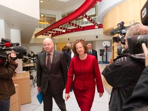 Alberta Premier Alison Redford and Minister of Health Fred Horne arrive to make the announcement of a Health Charter at the Glenrose Rehabilitation Hospital in Edmonton, Alta. on Monday, Nov. 18, 2013. In addition to the charter, that sets out the government's commitment to the principles of the Canada Health Act, the province will establish a Health Advocate's office to help Albertans navigate the health system. Amber Bracken/Edmonton Sun