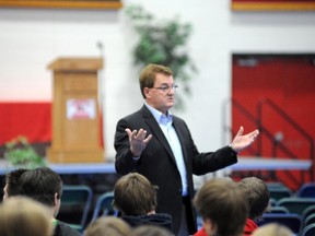 Vegreville-Wainwright MP, Leon Benoit speaks to students, staff, and the general public at a town hall meeting held at J.R. Robson School last week.