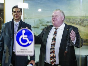 Toronto Mayor Rob Ford walks to his door with a Fox News crew in his office in City Hall  in Toronto, Ont. on Tuesday November 19, 2013. Ernest Doroszuk/Toronto Sun/QMI Agency