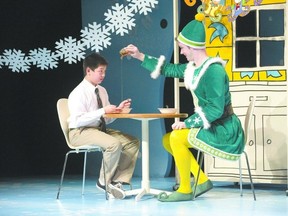 Liam Tobin pours maple syrup on Justin Eddy?s spaghetti in Elf, the musical, which is in previews until Nov. 28 and opens Nov. 29 at the Grand Theatre. (DEREK RUTTAN, The London Free Press)