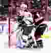 Ottawa Senator Marc Methot tries to clear Minnesota Wild Ryan Suter from in front of goaltender Craig Anderson during NHL action in Ottawa, Ont. on Wednesday November 20, 2013. Errol McGihon/Ottawa Sun/QMI Agency