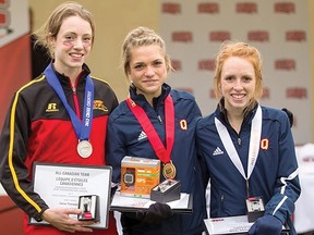 Julia-Anne Staehli of Lucknow, centre, earned a gold medal at the Canadian Interuniversity Sport (CIS) championships and was named CIS Athlete of the Year on Nov. 9, 2013. (Photo courtesy CIS)