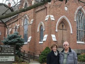 Church council chair Janet Johnston and board of trustees chair George Service pose in front of Victoria Avenue United Church. The church will hold its last service on Sunday, Nov. 24 at 10 a.m. and will be demolished early in 2014.