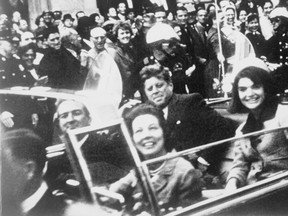 Former U.S. President John F. Kennedy, first lady Jacqueline Kennedy and Texas Governor John Connally and his wife are pictured riding in the presidential motorcade moments before Kennedy was shot in Dallas,Texas, in this handout image taken on Nov. 22, 1963. 
REUTERS/Victor Hugo King/Library of Congress/Handout