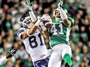 Roughriders safety Tyron Brackenridge (41) goes up to force an incomplete pass against Argonauts’ Jason Barnes during their September game at Mosaic Stadium. (Reuters)