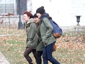 Queen's University students brave the cold, windy weather near the Summerhill area of the university  during class change on Monday morning.
IAN MACALPINE/KINGSTON WHIG-STANDARD/QMI AGENCY