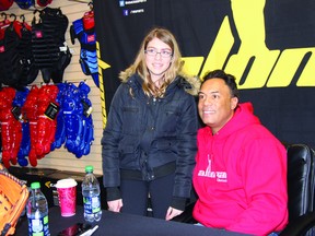 Madison Lee traveled with her father from Bomanville to London to meet former Toronto Blue Jays star Roberto Alomar Nov. 23, 2013. Alomar made an appearance at Home Run Sports in London to greet fans and promote his new line of “Alomar Baseball” products.
JACOB ROBINSON/AGE DISPATCH/QMI AGENCY