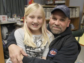 Devon Cobb, a Grade 6 student at J.R. Henderson Public School, and her dad Sterling will be holding her sixth annual Christmas toy drive on Friday, Dec. 6 through her Auden Park neighbourhood.
Michael Lea The Whig-Standard
