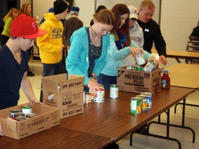 Brent Lingard’s Grade 8 class was hard at work organizing and counting items for the Salvation Army’s Christmas food hampers on Thursday, Nov. 28. (DAVE FLAHERTY/GODERICH SIGNAL-STAR)