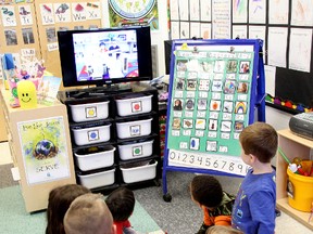 Students in Carrie Cicchelli full day kindergarten class draw out a structure that was created by two students earlier in the week. Her class uses an iPhone and Apple TV to make learning visible. MELANIE ANDERSON/THE OBSERVER/QMI AGENCY