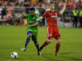 TFC’s Steven Caldwell (right) (GETTY IMAGES).
