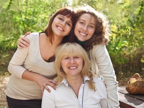Mother with daughters. (Fotolia.com)