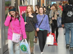 Crowds take advantage of Black Friday sales at the Eaton Centre in Toronto on November 29, 2013. (QMI AGENCY/Stan Behal)