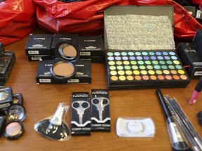 Counterfeit goods are on display at Toronto Police headquarters on Nov. 29. More than 20 people face 100 charges as part of Project PACE. (VERONICA HENRI/Toronto Sun)