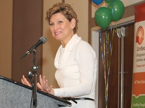 United Way campaign chairwoman Lori MacDonald addresses Friday morning's touchdown breakfast at the Ambassador ballroom in front of more than 500 campaign volunteers.
Michael Lea The Whig-Standard