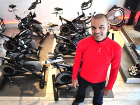 Endurance athlete and personal trainer Shayne Hodgson, owner of Pulse Spin Studio, stands inside his new intimate spin studio in London Ont.’s Wortley Village Nov. 28, 2013. CHRIS MONTANINI\LONDONER\QMI AGENCY