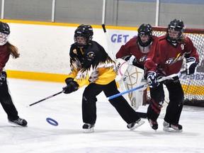 Carley Ethelston (right) of the U19 ringette team scored two goals in a recent 6-0 win over London in WRRL action. ANDY BADER/MITCHELL ADVOCATE