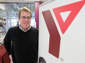 Kent Paterson, CEO of YMCA-YWCA Winnipeg, stands in his facility in Winnipeg, Man. Dec. 2, 2013 after the city announced it would invest $46.7 million in three new Y facilities in Winnipeg over the next 11 years. Trouble is, the province has no plans to contribute its third.