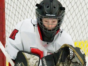 Medway Cowboys goalie Shauna Hatton is a study in concentration as she makes a save during a TVRA girls? hockey game against the Strathroy Saints in Komoka on Tuesday. Hatton and the Cowboys won 3-1. (DEREK RUTTAN/The London Free Press)