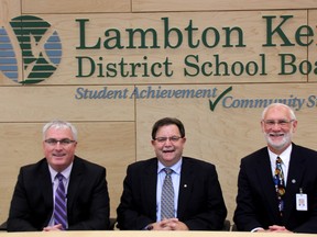 Scott McKinlay (centre) was acclaimed chair of The Lambton Kent District School Board and Ian Cryer (right) vice-chair. Education director Jim Costello (left) helped welcome the two back to their positions at the Annual Organization Meeting Tuesday. MELANIE ANDERSON/THE OBSERVER/QMI AGENCY