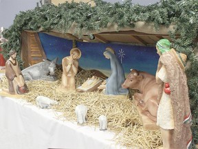 Among the nativity scenes on display at Journey to the Manger is this set from Blessed Sacrament Church. When the church was searching for a new nativity set to purchase, the late Frances Crummer located a Mexican set that had been on display during Expo 67 in Montreal. It was created by an artist and has been restored twice. Gord Wolfe built the stable.