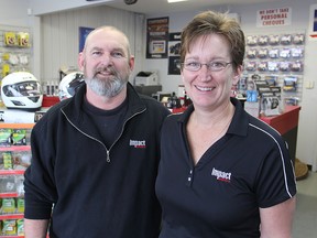 Doug and Belinda Bancroft run Impact Battery and Powersport on Midland Avenue, selling batteries and accessories.
Michael Lea The Whig-Standard