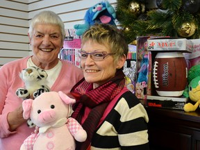 Betty Beuttenmiller and Norma Khan, of Bethel Bible Church, show off just some of the generous toy donations given by Seaforth residents for this year’s annual Christmas Bureau.
