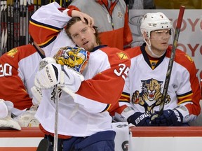 Florida Panthers goaltender Jacob Markstrom stands near the bench during a break in the action against the Winnipeg Jets during the first period of their NHL hockey game in Winnipeg April 11, 2013. (REUTERS)