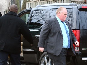 Mayor Rob Ford leaves his home, headed to City Hall in Toronto, on Thursday, December 5, 2013. (Dave Abel/Toronto Sun)