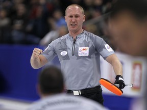 Brad Jacobs celebrates a win over Kevin Martin at the Roar of the Rings Canadian Olympic curling trials at MTS Centre in Winnipeg, Man., on Thur., Dec. 5, 2013. Kevin King/Winnipeg Sun/QMI Agency