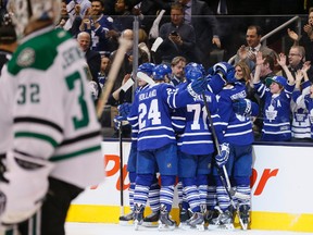The Maple Leafs celebrate their win over the Dallas Stars. (Stan Behal, Toronto Sun)