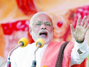 Hindu nationalist Narendra Modi, prime ministerial candidate for India?s main opposition Bharatiya Janata Party (BJP), addresses a rally in the northern Indian city of Agra last month. Modi used a large rally in the historic city of Agra to push his Hindu nationalist agenda in a key election state where the sizeable Muslim minority eyes his campaign with alarm. But Tarek Fatah says Muslims, like most other Indians, still favour Modi over Prime Minister Manmohan Singh or his puppet Sonia Gandhi. (Anindito Mukherjee/REUTERS)