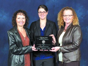 At right, Brigitte Loeppky, manager of Quality/Risk/Education/Telemedicine; Erin Mudry, physiotherapist; and Kathy Dawe, vice-president of patient services and chief nursing officer accept the Quality Healthcare Workplace Award on behalf of the Lake of the Woods District Hospital.