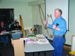 Trapper instructor Ken Maw demonstrates the different types of spring snares to students attending a trapper certification course in Kenora.