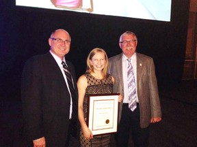 Jenna Wilkins, Edwin Parr Award recipient stands with PSD Supt. Tim Monds (left) and board chair Eric Cameron on Nov. 18 after receiving the prestigious provincial award, given by the Alberta School Boards’ Association. - Photo Supplied