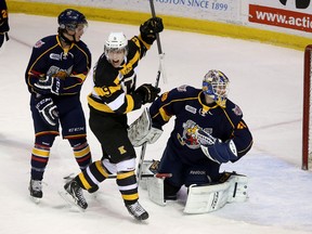 Kingston Frontenacs' Ryan Verbeek celebrates teammate Ryan Kujawinski's goal against the Barrie Colts in front of goalie MacKenzie Blackwood and defenceman Josh Carrick during Ontario Hockey League action at the Rogers K-Rock Centre Friday night. (Ian MacAlpine/The Whig-Standard)