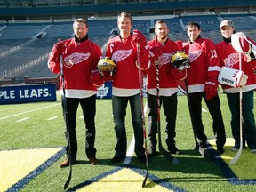 Detroit Red Wings players (L-R) Niklas Kromwall, Nicklas Lidstrom, Henrik Zetterberg, Pavel Datsyuk and Jimmy Howard stand on the field at Michigan Stadium during an announcement last February saying that the team will host the Toronto Maple Leafs at Michigan Stadium on the University of Michigan campus in the NHL Winter Classic. (Reuters)