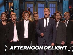 One Direction, host Paul Rudd and “Anchorman 2” co-stars Will Ferrell, Steve Carell and David Koechner. (YouTube)